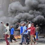 Police fire tear gas on protesting farmers in Delhi